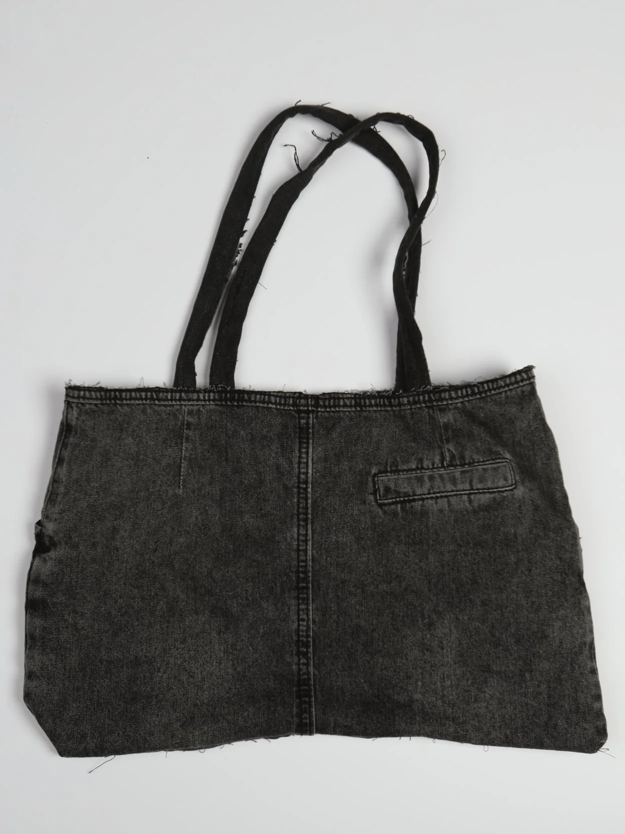 back+of+black+bag.png