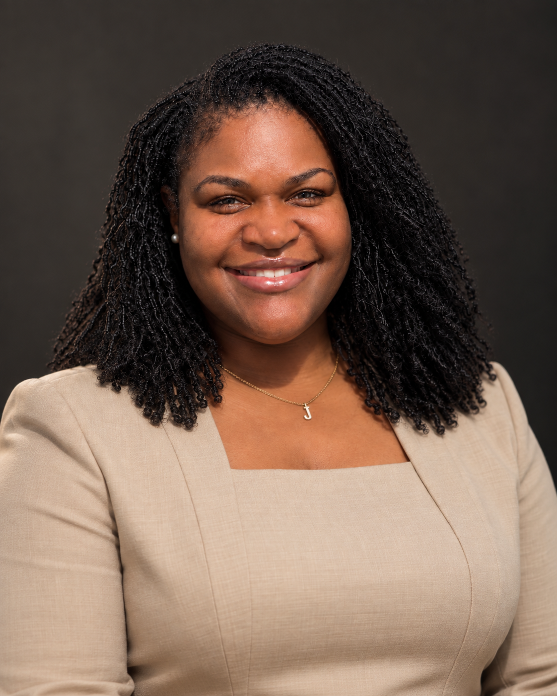 Julie Harris, psychiatric mental health nurse practitioner, smiling in a professional portrait.