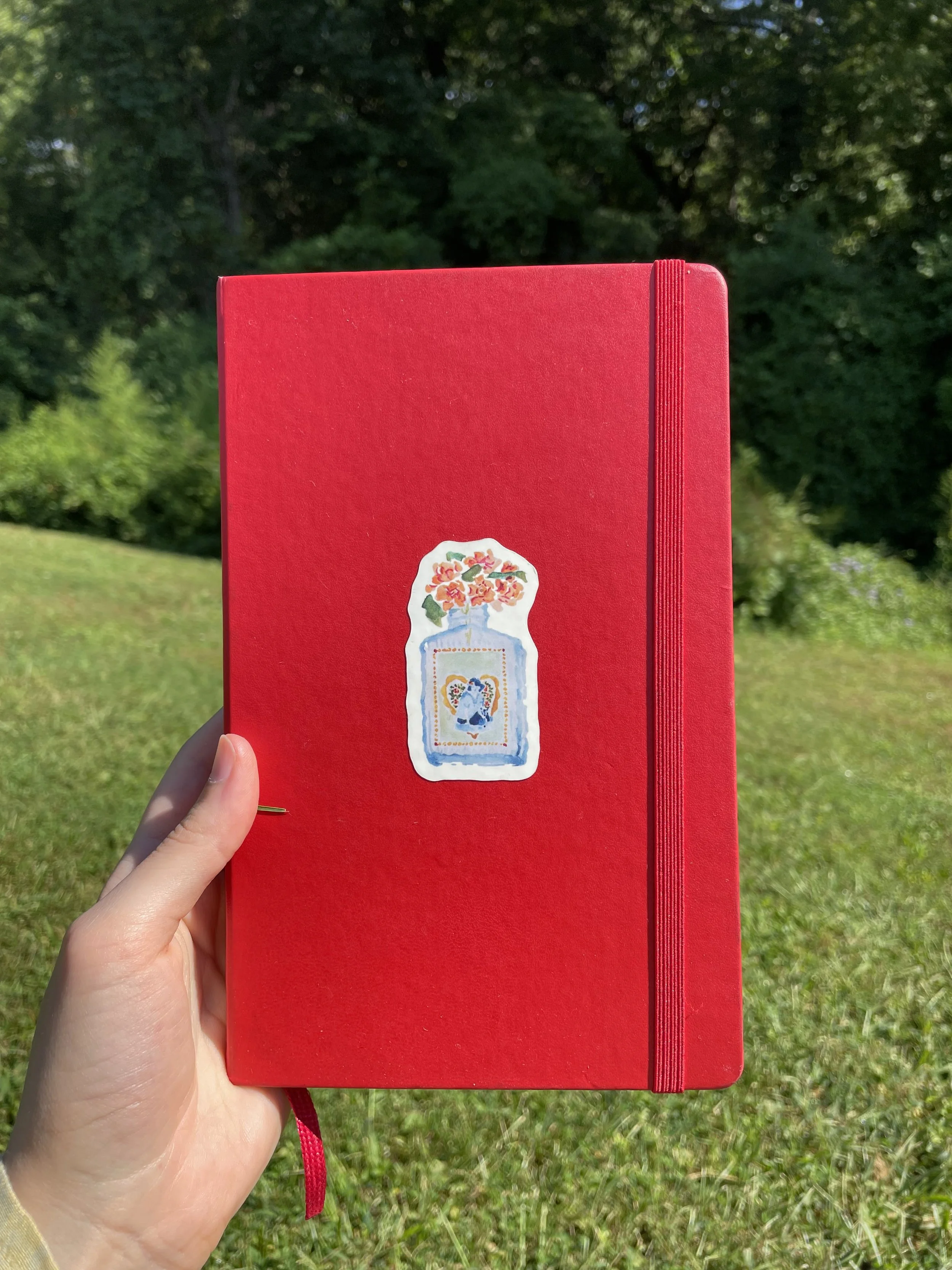 rose bottle on journal.jpg
