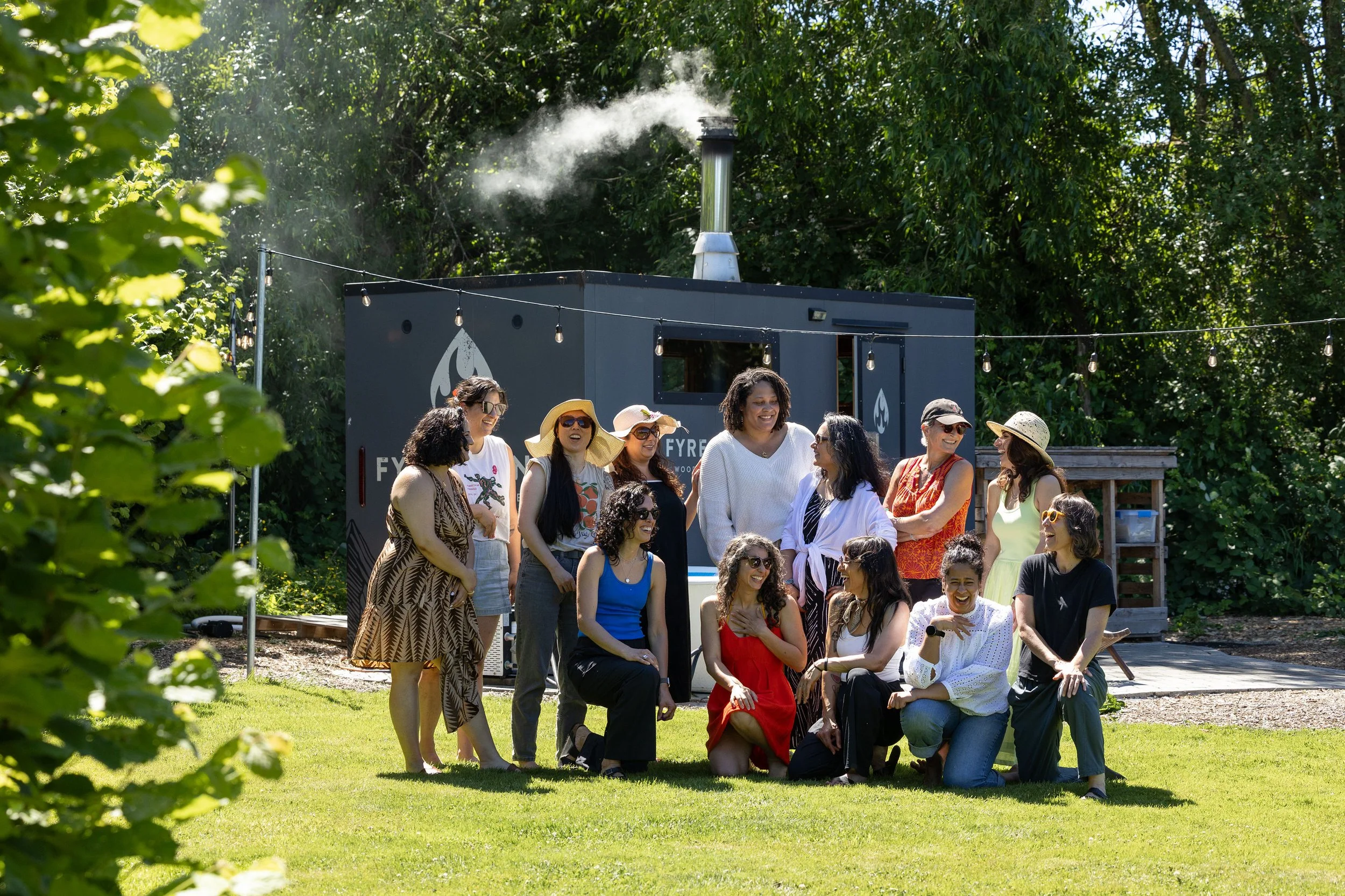 Retreat participants gathered outdoors on the farm, sharing community, connection, and time together in nature.