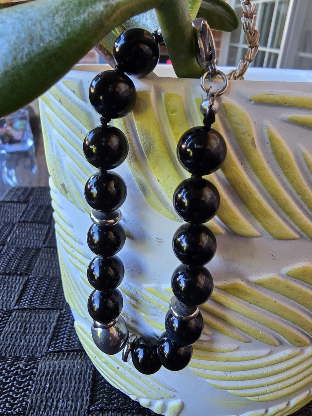 Black-Obsidian-Bracelet-_-10mm-with-Stainless-Steel-Baryl-Accents---Stone-of-Protection-and-Truth-1.jpg
