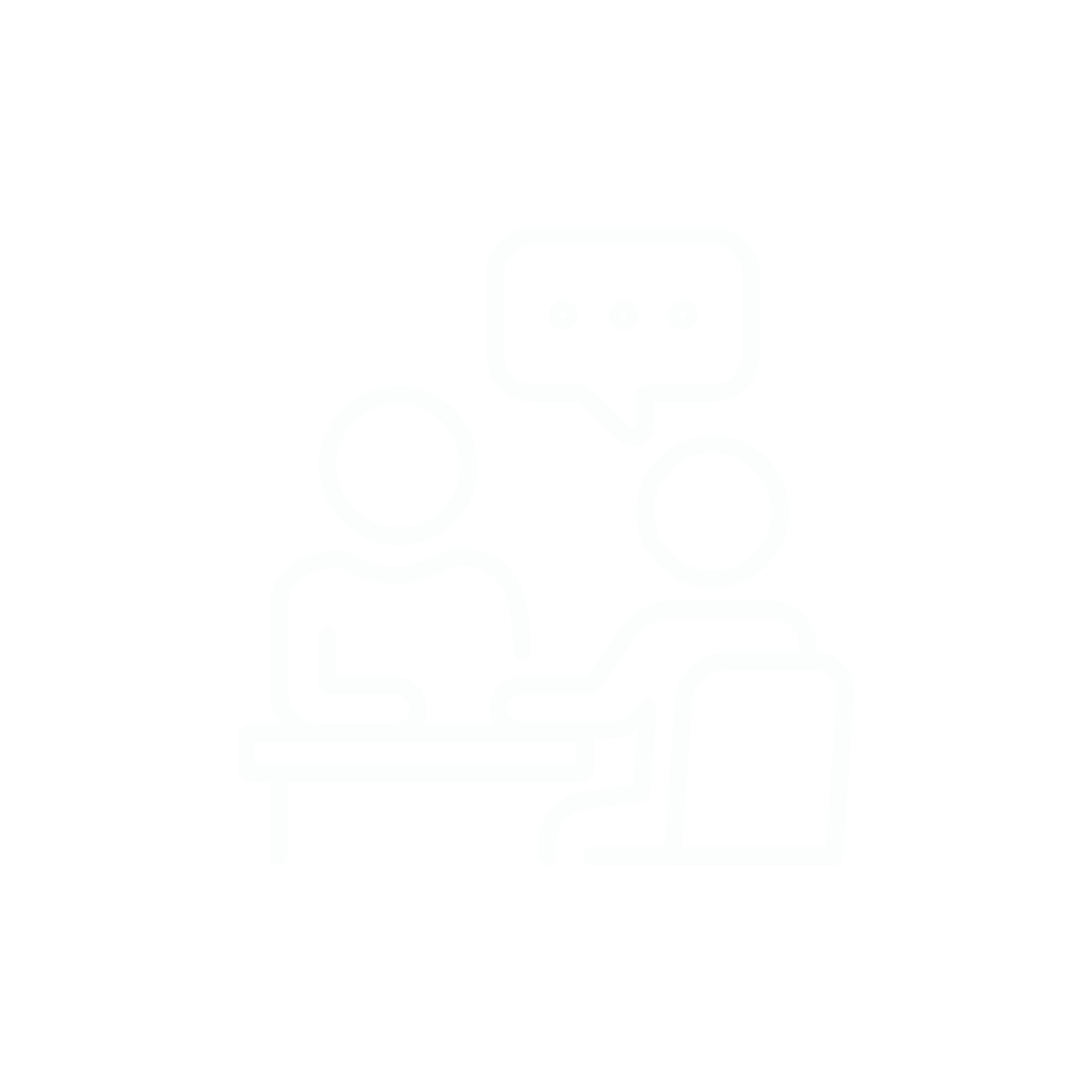 Line drawing of two people having a conversation at a table, with a speech bubble containing three dots above them.