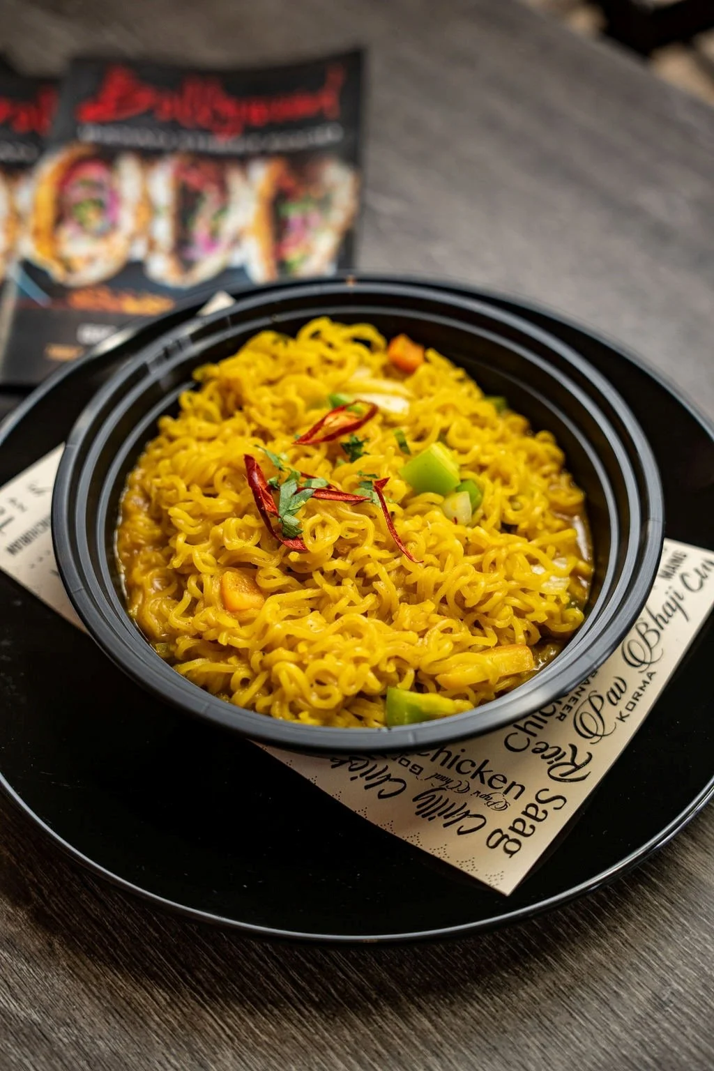 Noodles prepared with Indian seasonings, fresh vegetables, and spices. | Vegetarian