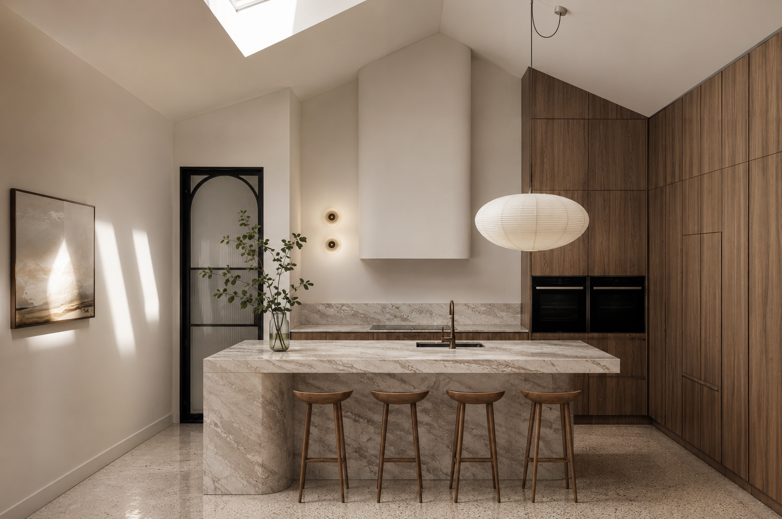 Modern kitchen with a marble island, wooden cabinets, a pendant light, a black door with glass, and a potted plant.