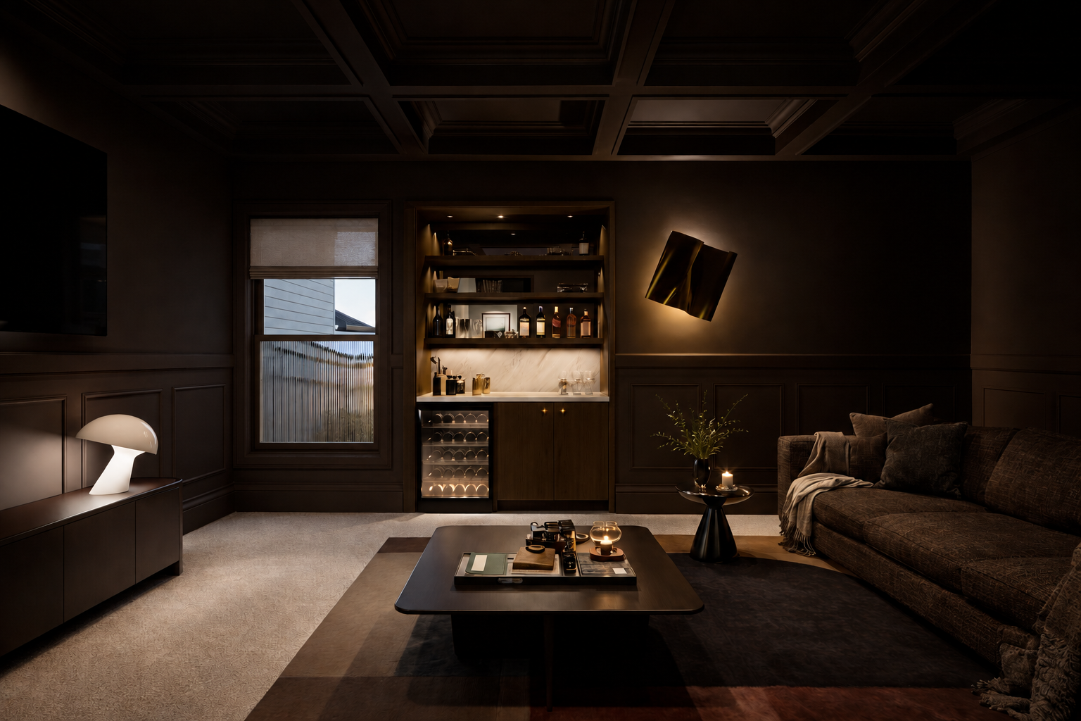 A custom luxury moody theatre room or gentleman's lounge with a feature coffered ceiling and natural stone bar for drinks.