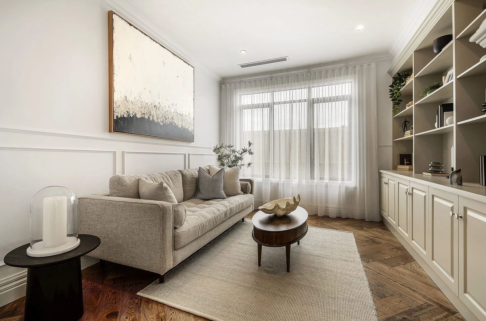 A formal lounge room with wainscoting and timber flooring.