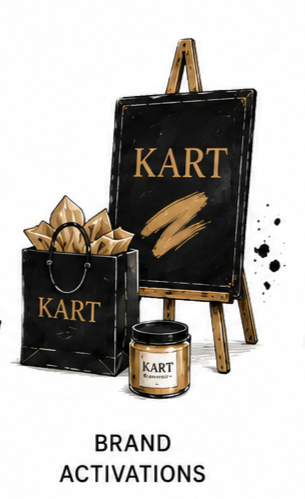 KART brand activation display with a chalkboard sign, a shopping bag, and a candle.