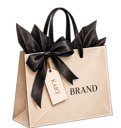 A beige shopping bag with black handles, decorated with black tissue paper and a large black bow. The bag has a white tag with the word 'KART' and the brand name 'BRAND' printed on it.