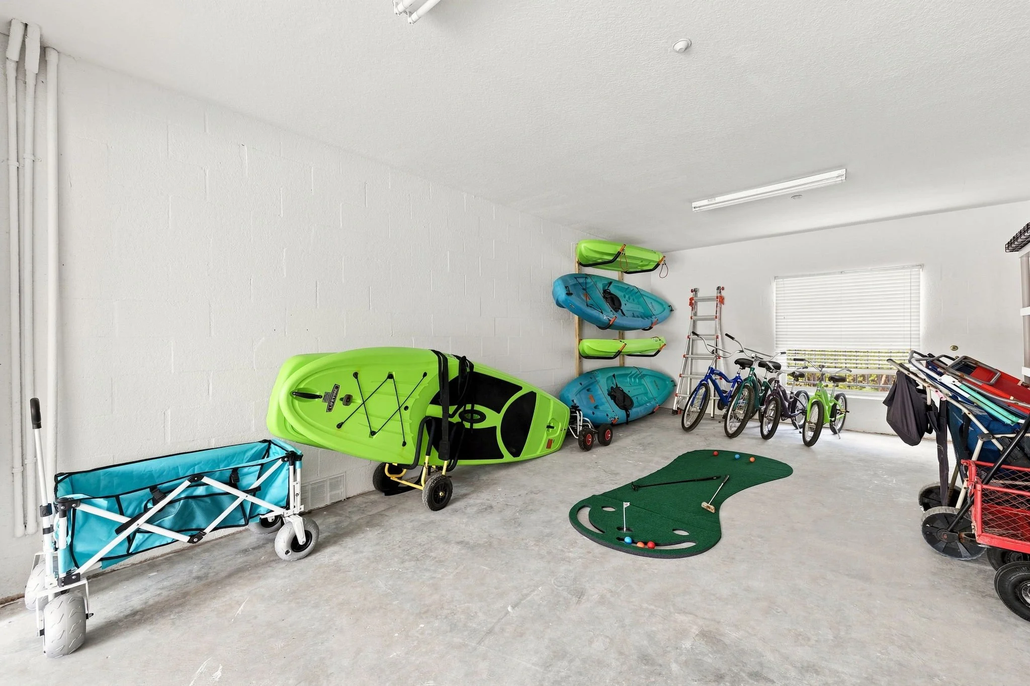 Beach wagon, kayaks, paddleboards, bikes, toys