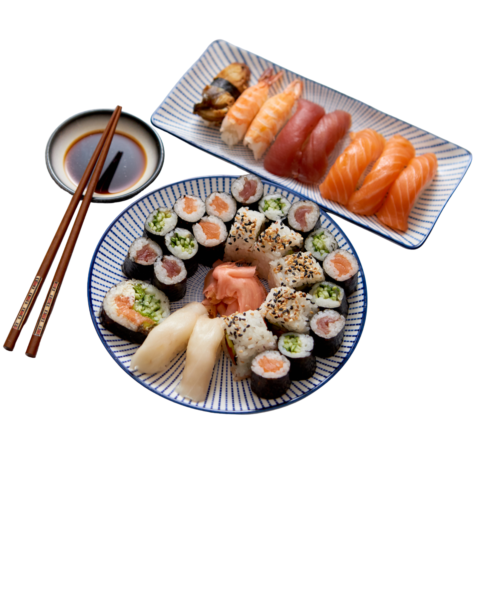 A plate of assorted sushi rolls with slices of salmon, tuna, shrimp, and other fish, accompanied by pickled ginger, wasabi, and soy sauce on a small bowl with chopsticks.