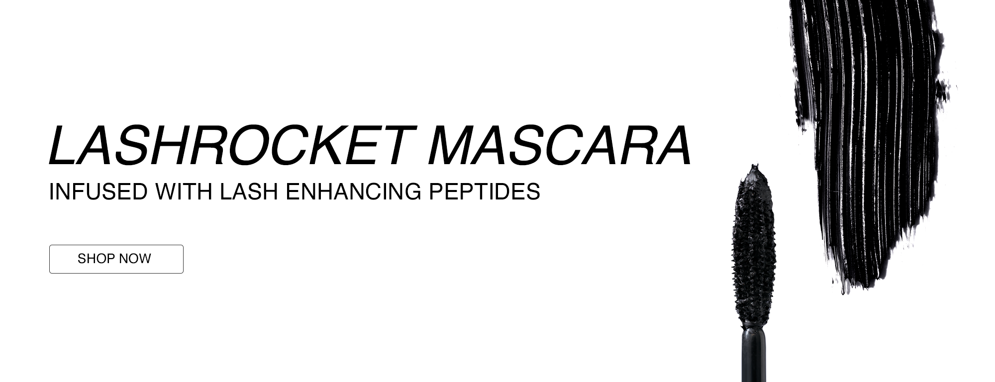 A black mascara wand coated with mascara and a black brush stroke on a white background, advertising Lashrocket mascara infused with lash enhancing peptides.