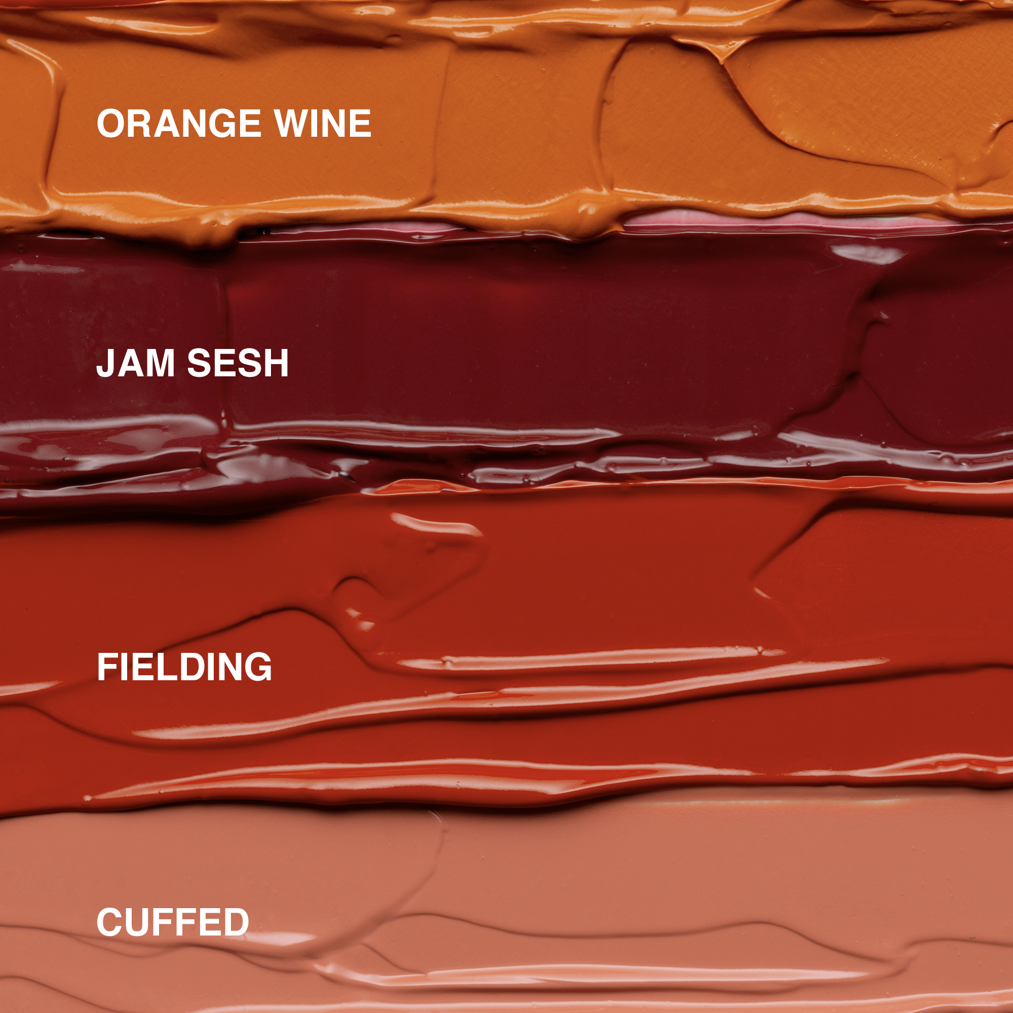 Close-up of a layered lines of  liquid blush in orange, purple,  red, and pink layers. The words 'Orange Wine', 'Jam Sesh', 'Cheddar', and 'Cuffed' are overlaid on the image.