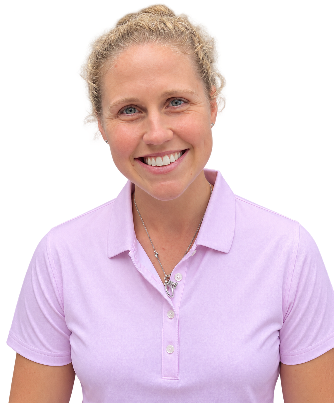 A woman with blonde curly hair, blue eyes, and a big smile wearing a light purple polo shirt and a silver necklace.