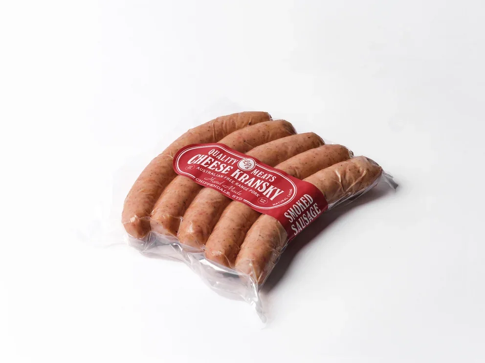 Pack of five smoked sausages in clear plastic packaging with a red label.