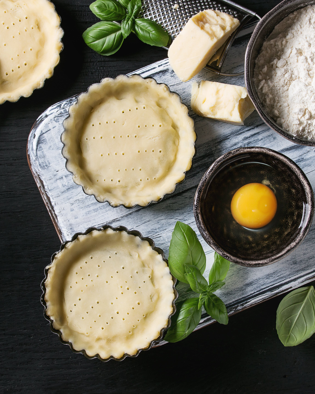 Fluted tart and quiche pans with removable bottoms.