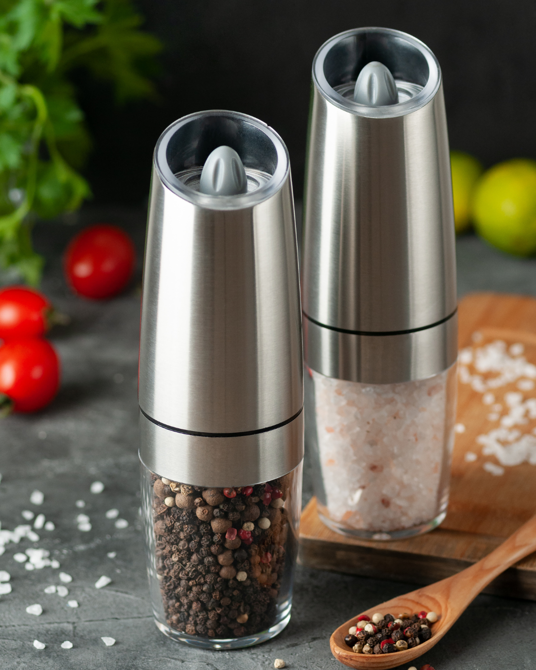 Salt and pepper grinders for seasoning food.
