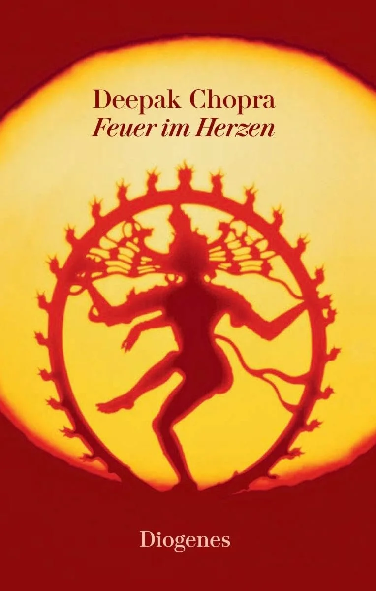 Das Buchcover zeigt eine orange-rote Illustration eines Tanzes, umgeben von einem kreisförmigen, feuerspeienden Stern, mit dem Titel "Feuer im Herzen" und dem Autorennamen Deepak Chopra.