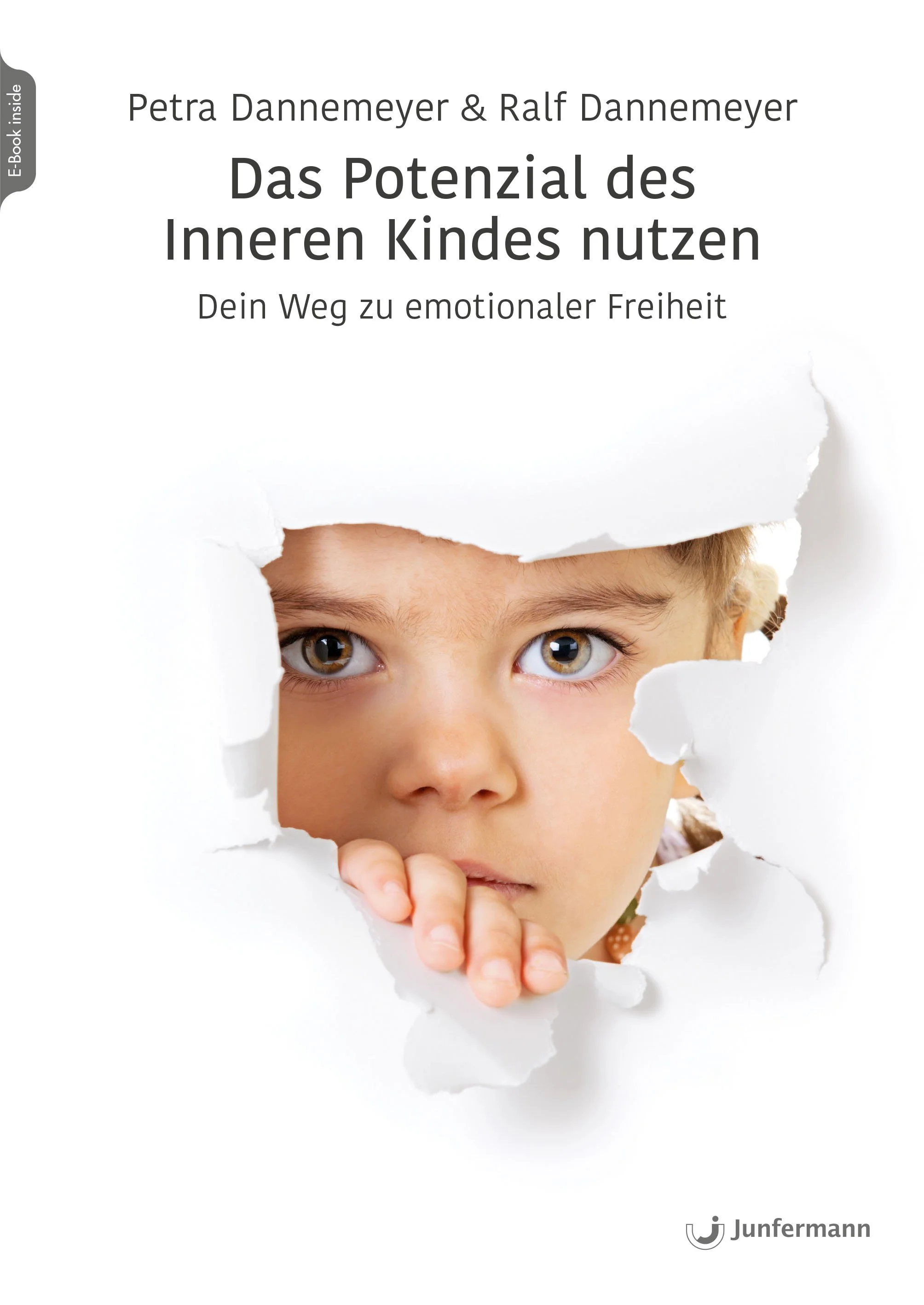 Das Buch zeigt eine Kinderzeichnung mit einem Blick durch eine zerbrochene Wand. Der Titel lautet 'Das Potenzial des Inneren Kindes nutzen', darunter steht 'Dein Weg zu emotionaler Freiheit'. Im unteren rechten Rand befindet sich das Logo des Verlags Junfermann.