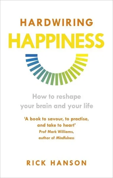 Buchcover mit Titel 'Hardwiring Happiness' und Untertitel 'Wie man sein Gehirn und Leben neu gestaltet', Autor Rick Hanson.