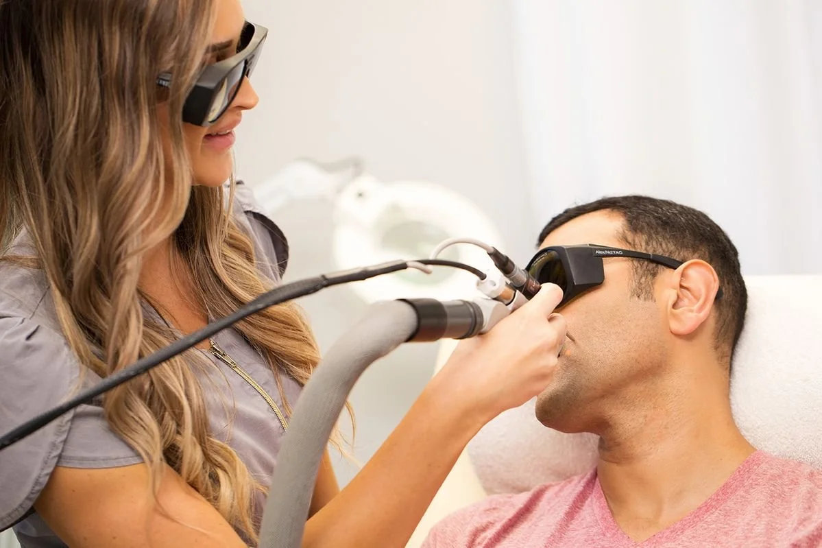 Laser hair removal on a male client with protective eyewear
