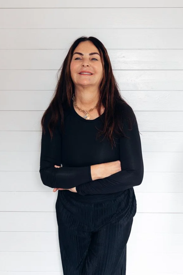 A brand photo of a female nurse practitioner and medical prescriber at her modern skin rejuvenation clinic in broadstone