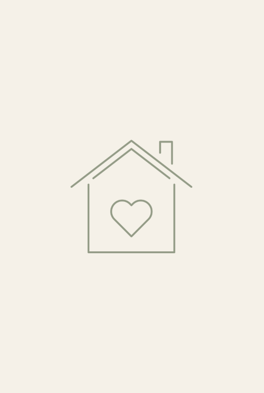 Outline of a house with a heart inside on a plain background.