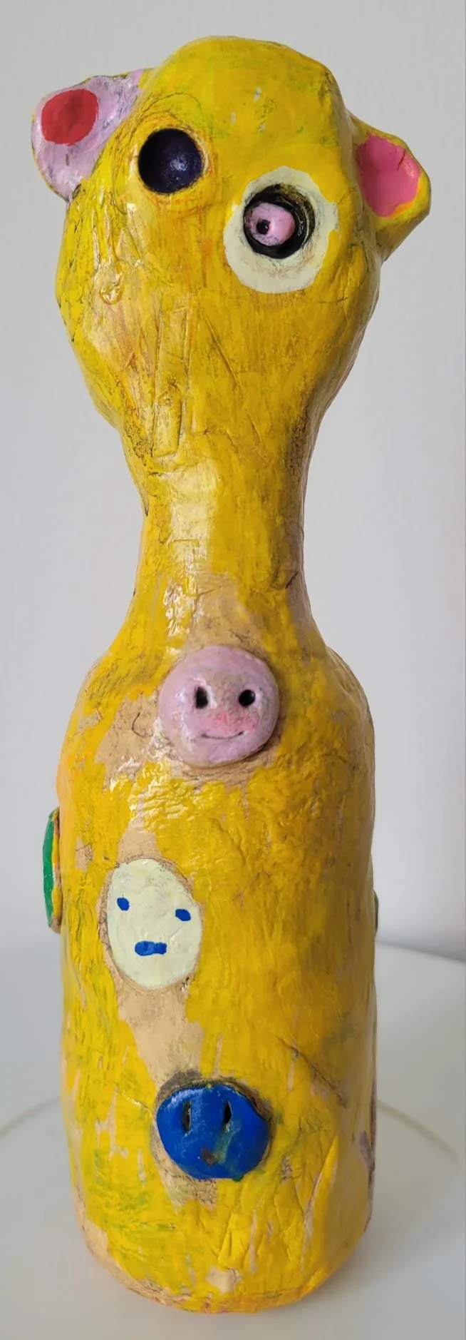 Zephyr 2026 clay and mixed media 4"x10" (10x26cm)