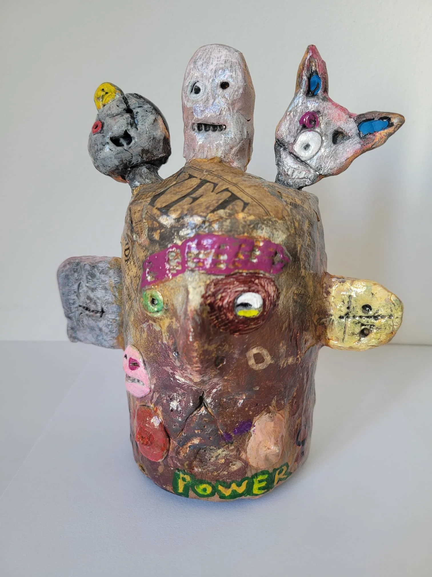 Chin Hippy (two sides) 2026 clay and mixed media 8"x10" (20x26cm)