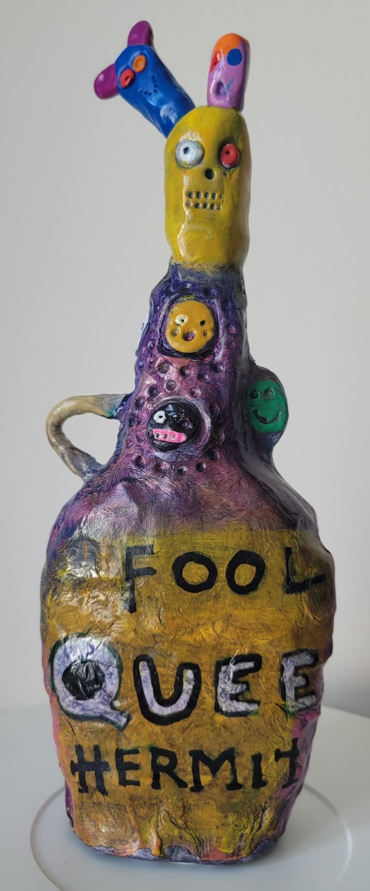 Queenie (two sides)  2026 clay & mixed media 5"x10" (13x26cm)
