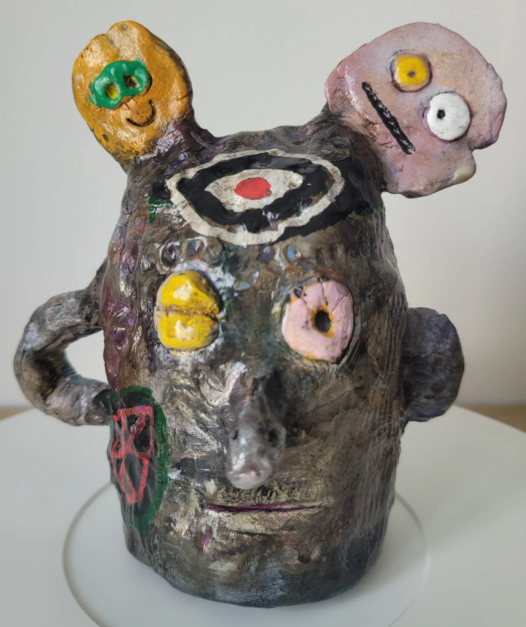 Rune (two sides) 2026 clay and mixed media 8"x8" (20x20cm)