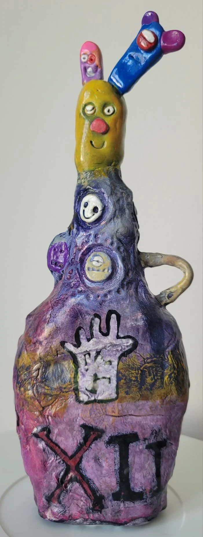 Queenie (two sides) 2026 clay & mixed media 5"x10" (13x26cm)