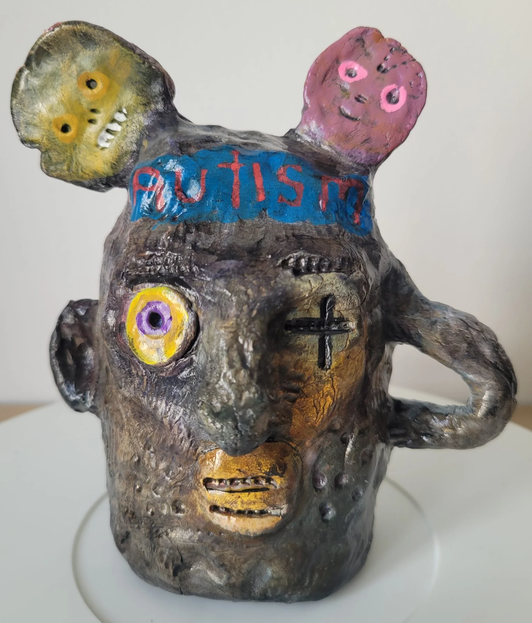 Rune (two sides) 2026 clay and mixed media 8"x8" (20x20cm)