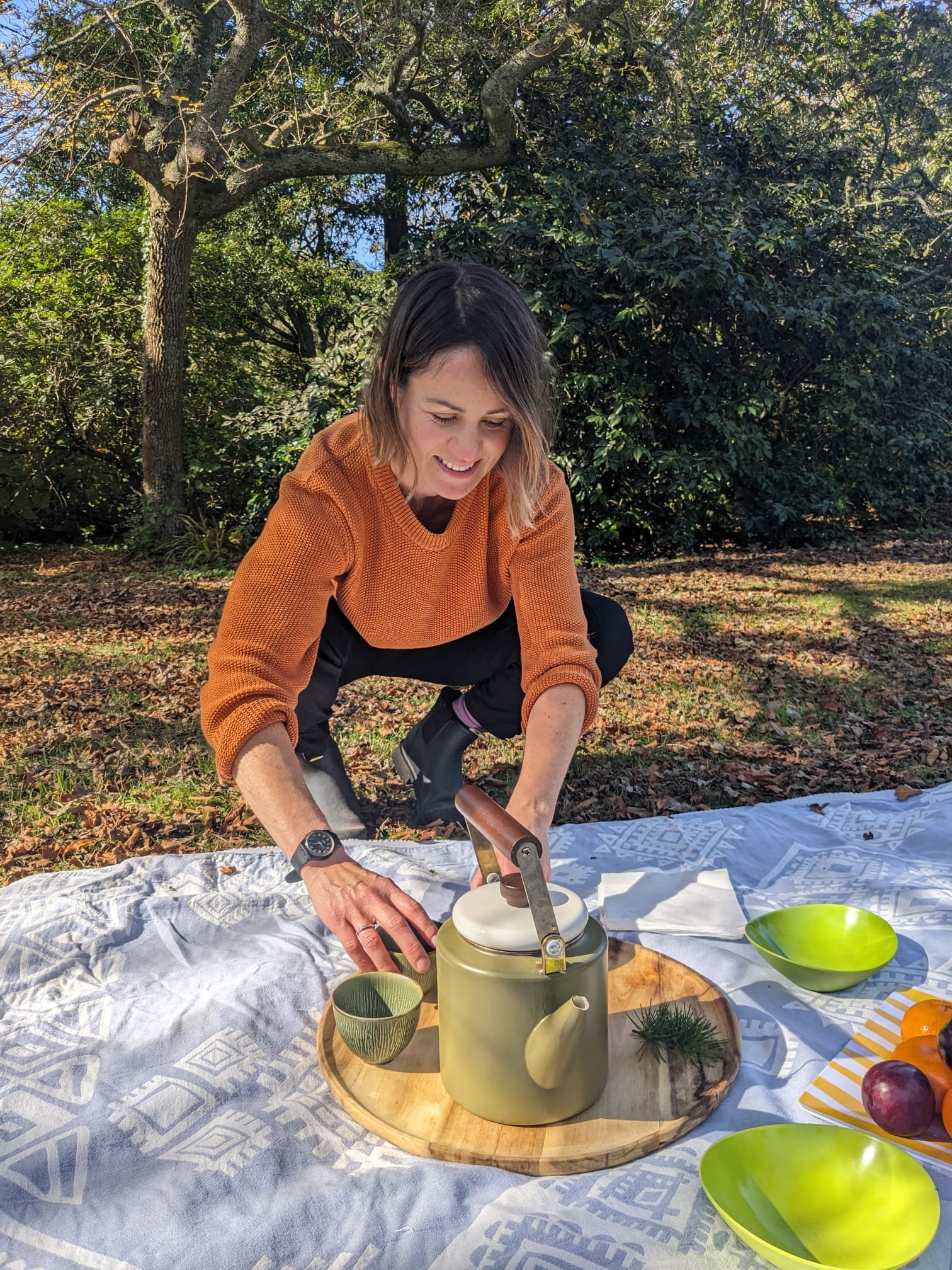 Chloe setting up for a Tea ceremony at Seawinds gardens