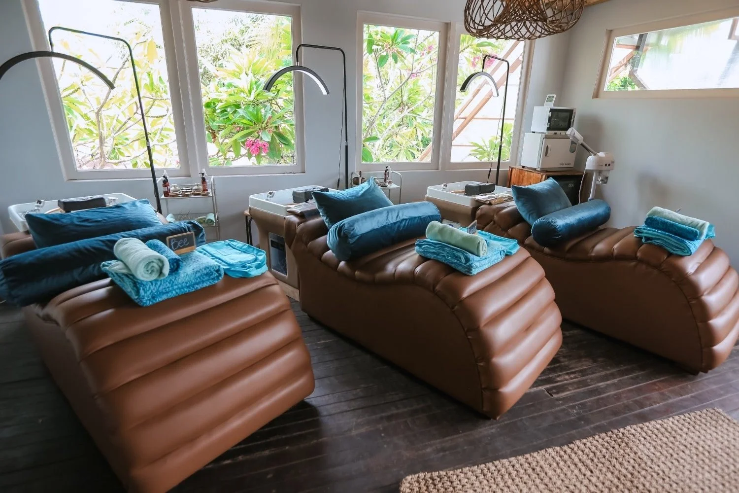 Japanese head spa treatment room at Azure Wellness & Spa in Gili Trawangan, featuring comfortable reclining spa chairs, soft towels, and natural daylight in a relaxing indoor setting.