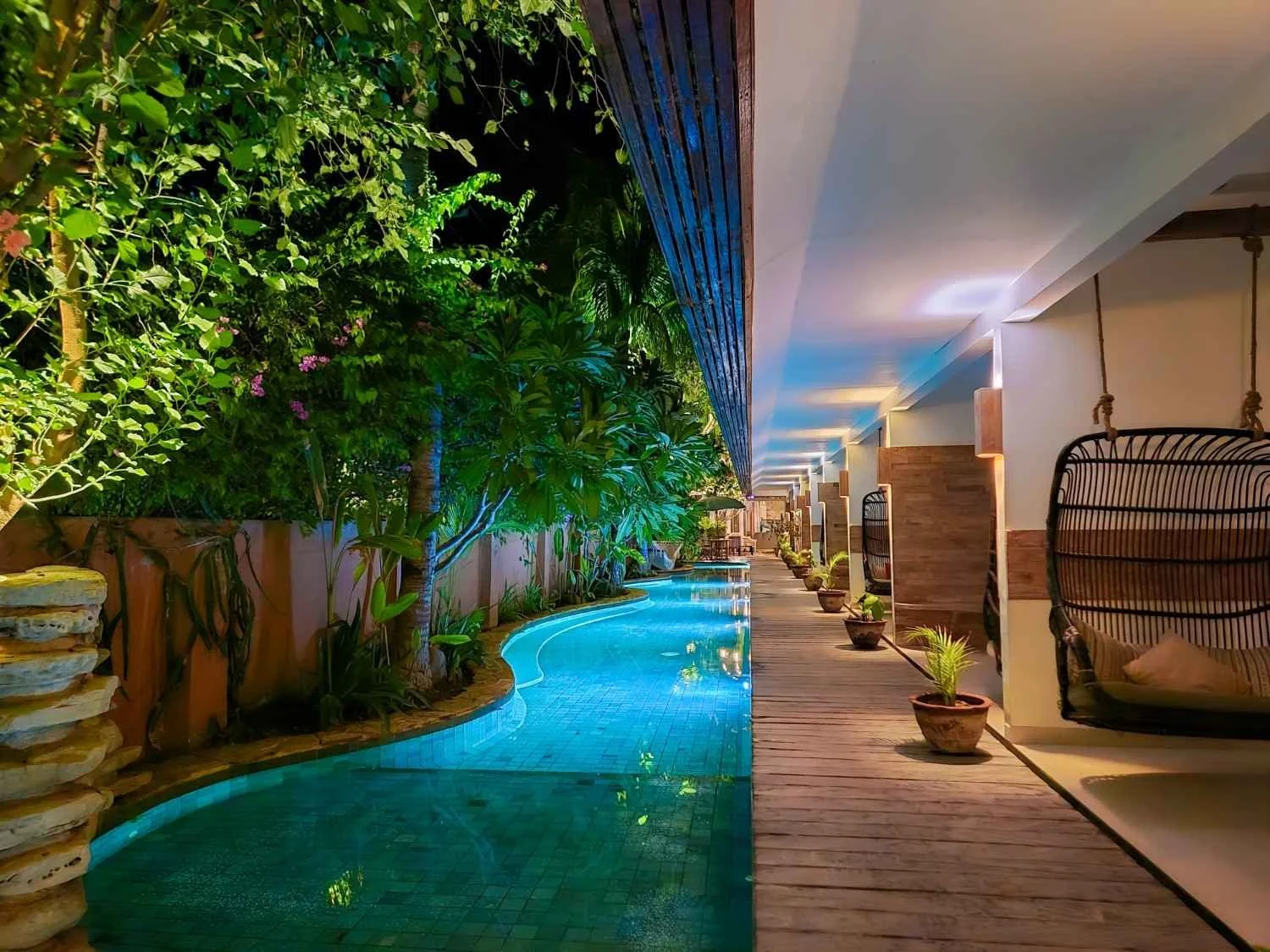 Night view of the poolside rooms at Pesona Beach Resort Gili Trawangan