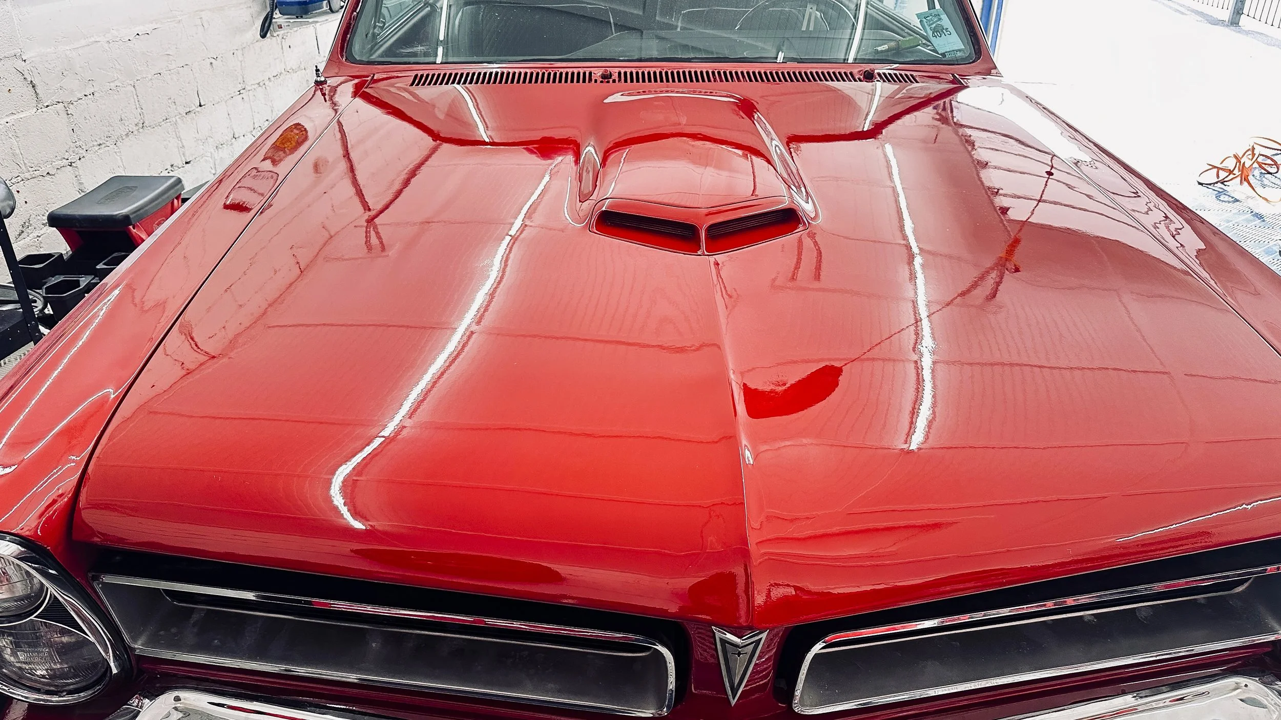 Red vintage Pontiac with hood scoop professionally detailed, Luxdream Car detailing, louisville kY