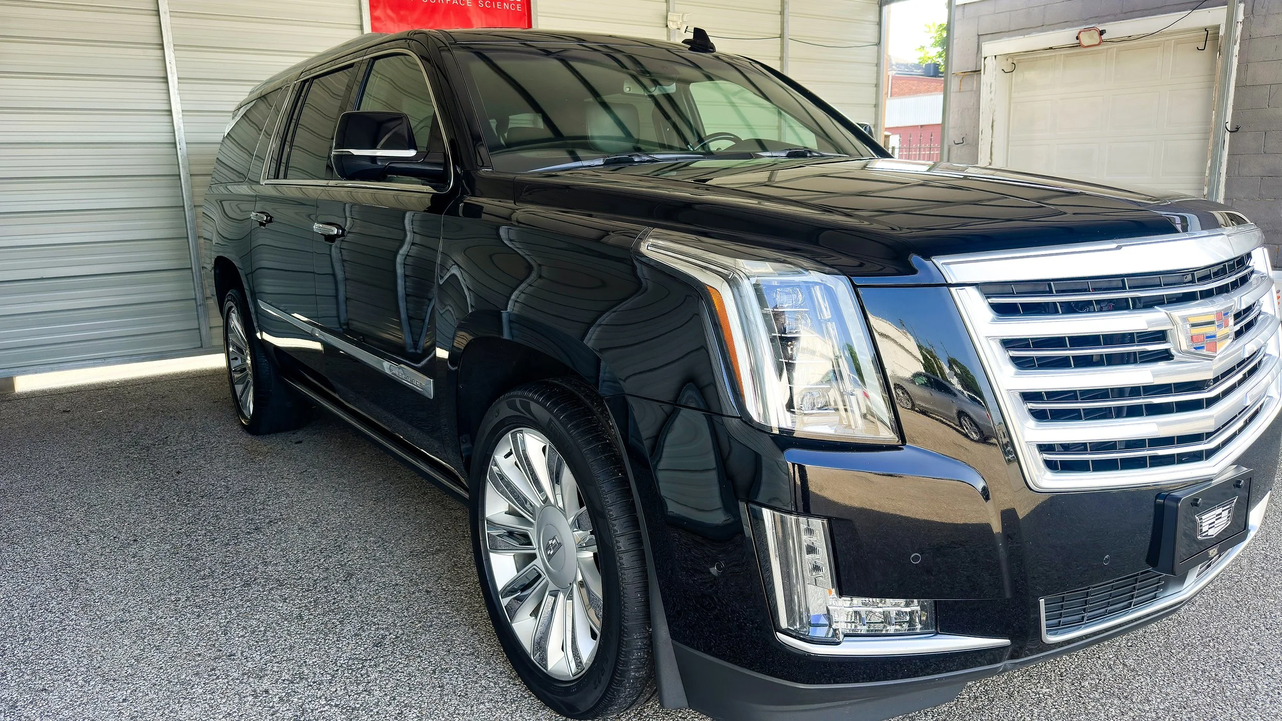 Black Cadillac Escalade professionally detailed by LuxDream Detailing in Louisville, KY