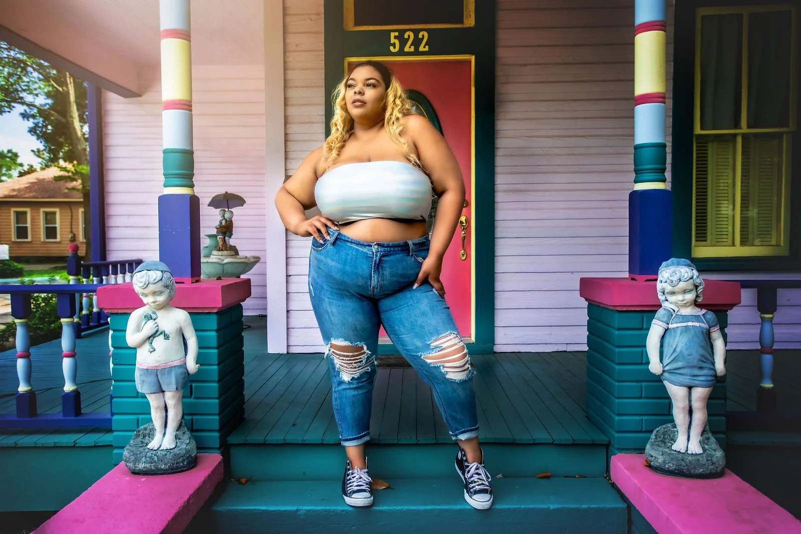 Woman standing on porch alternative session in Lake Charles la