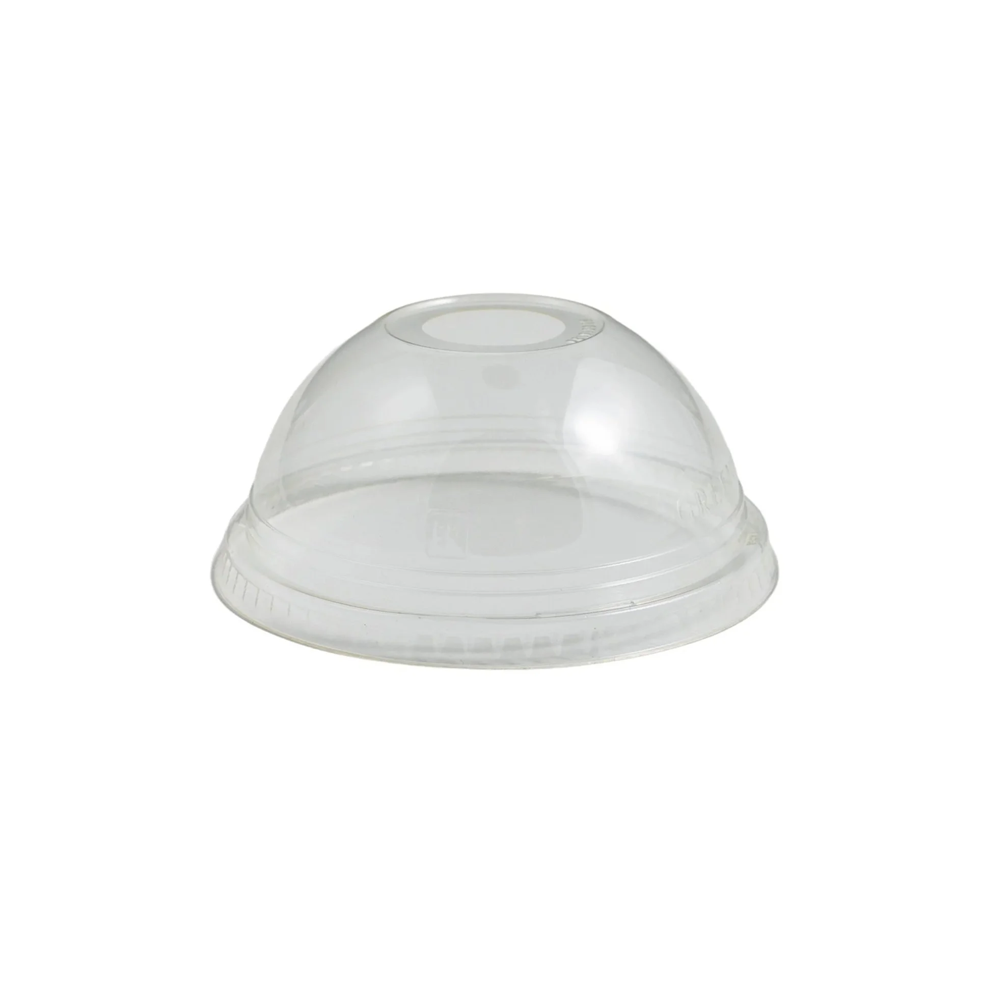 Close-up of a glass dome-shaped cover on a white surface with a plain vice background.