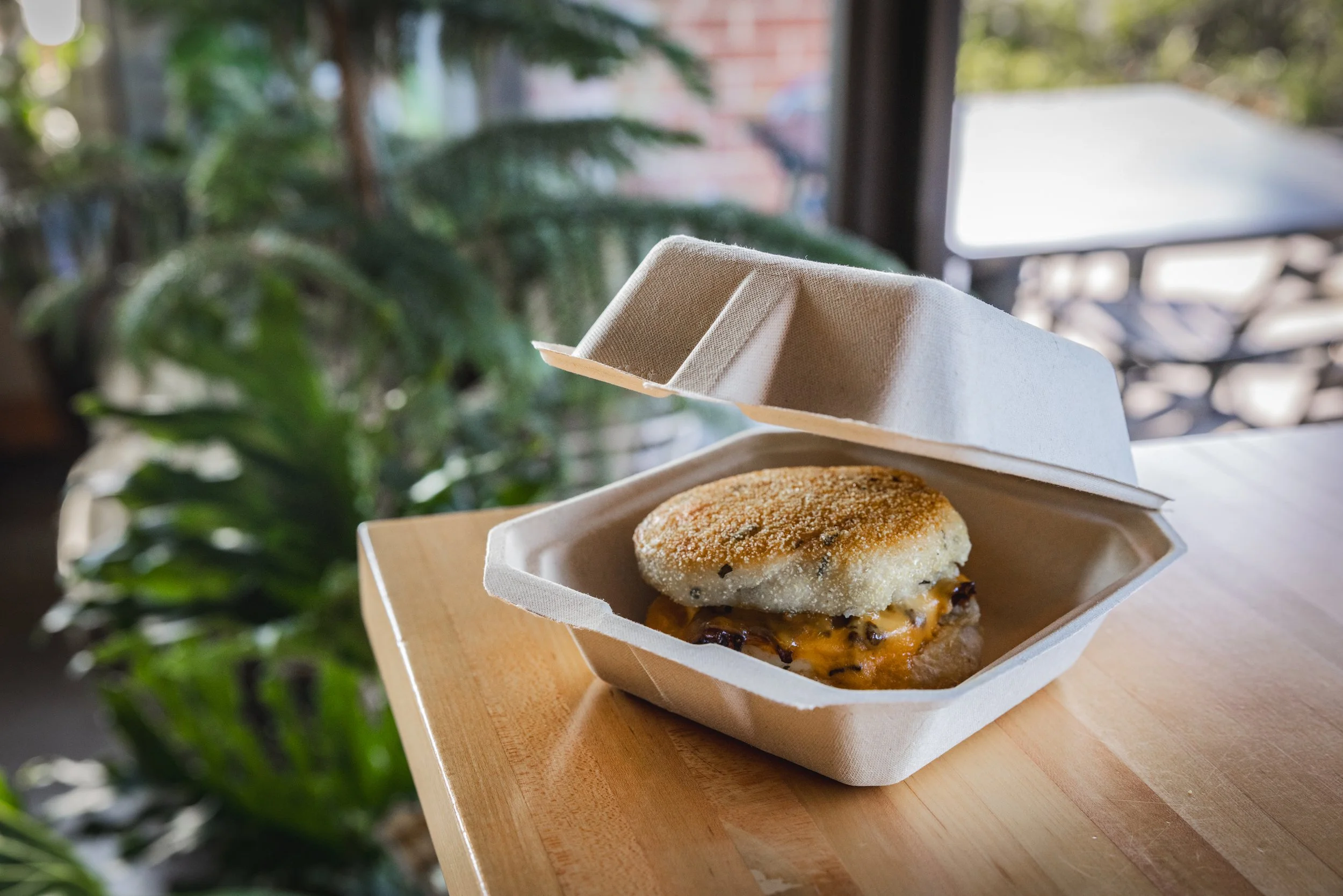 Sandwich served in a Terravive compostable clamshell container