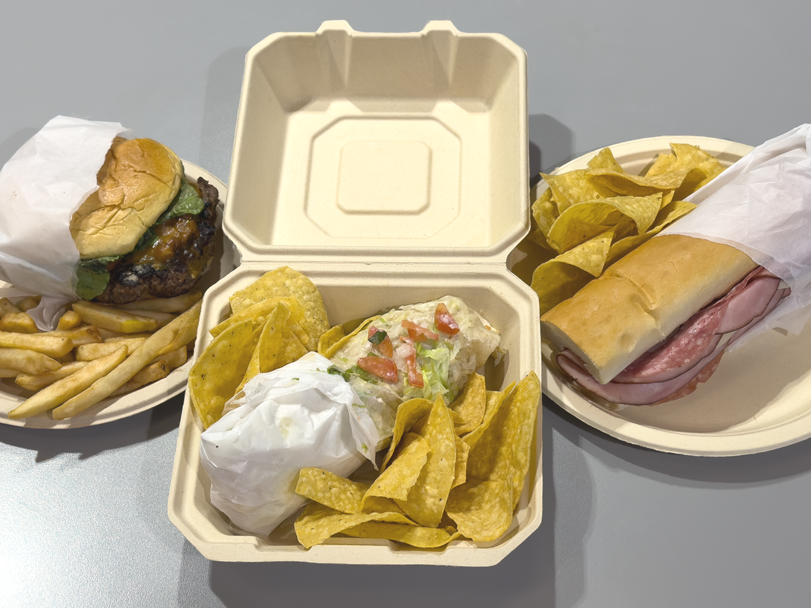 Various foods served in Terravive compostable food wraps