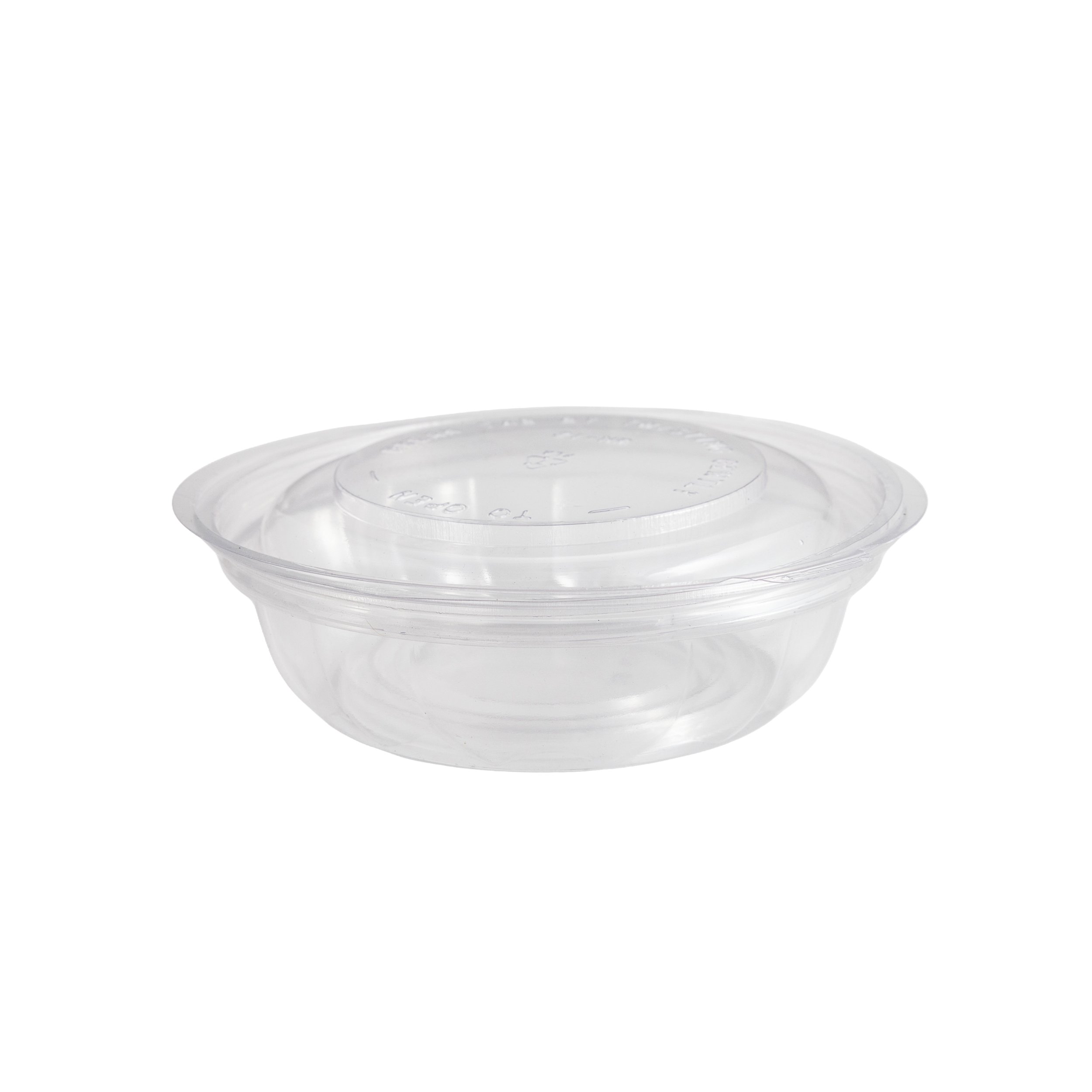 Close-up of a clear plastic food container with a slightly domed lid, reflecting light.
