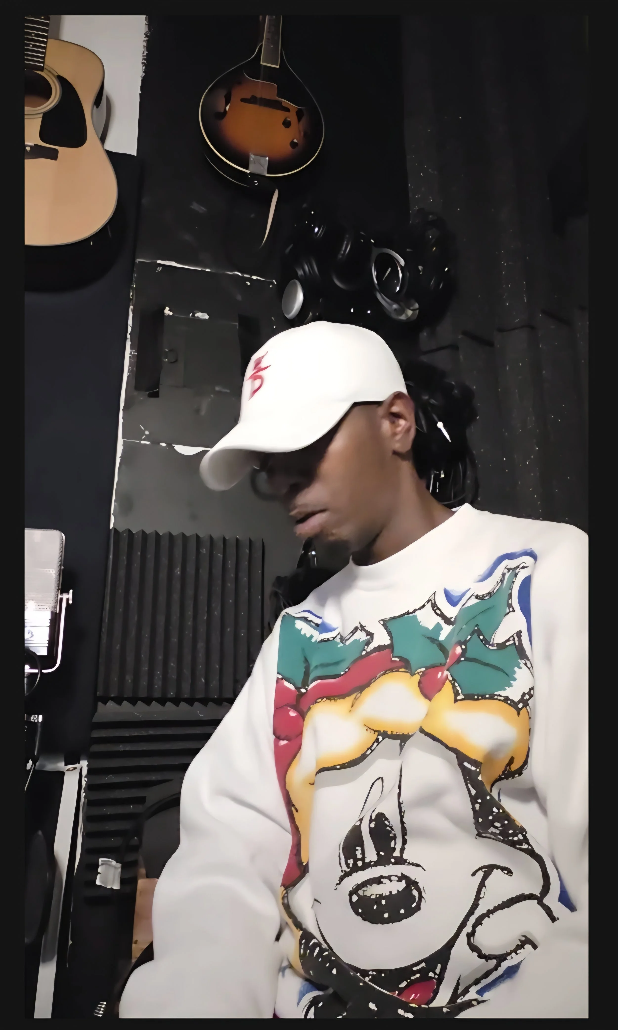 Mister WonderFu in a New York City music studio recording his latest project , The Fu-Print