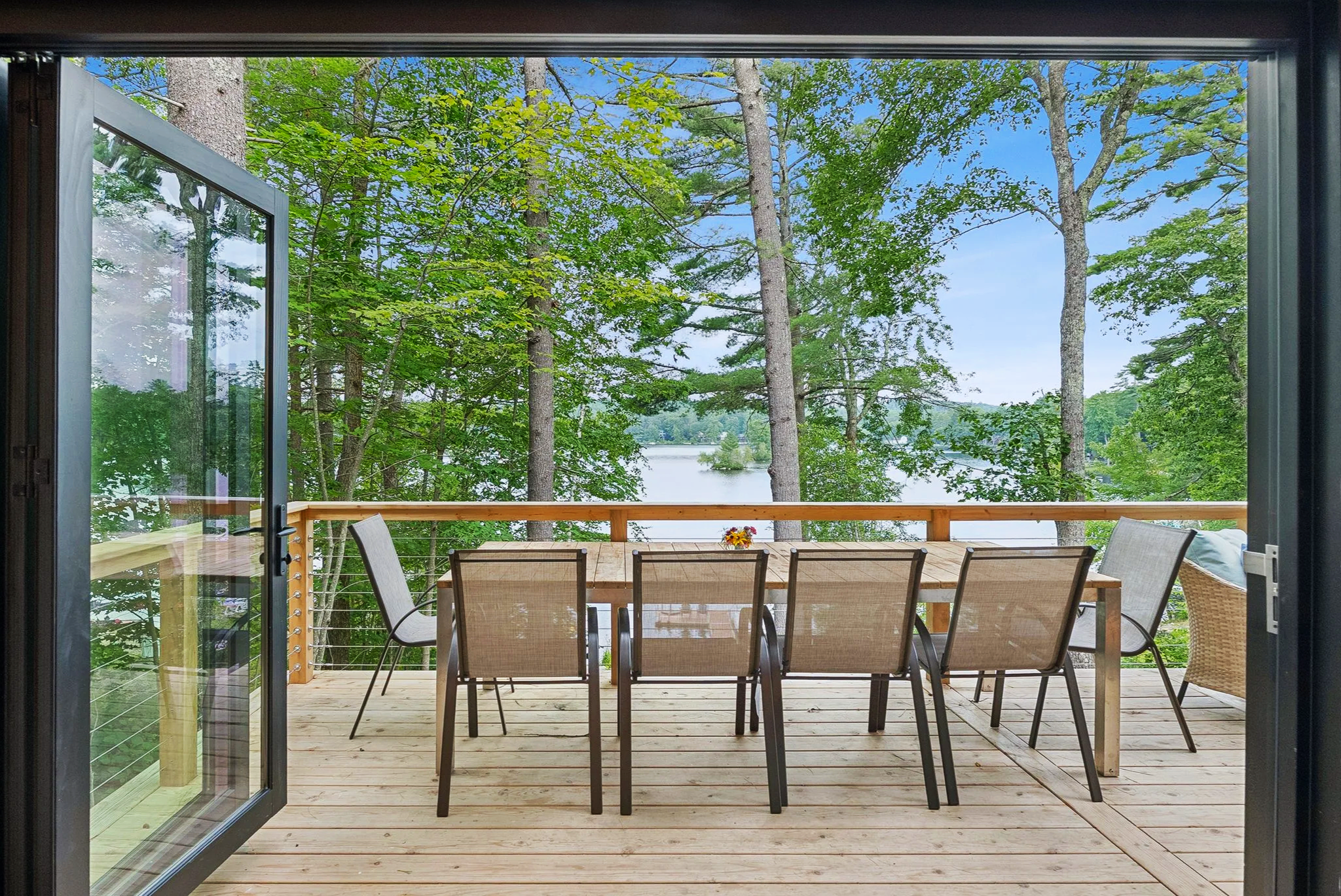 Lake View, Cedar Deck, Tri-Fold Doors, Maine Lake, General Contracting, Residential Construction, Maine, Lake Home Building, Summer House, Custom Carpentry