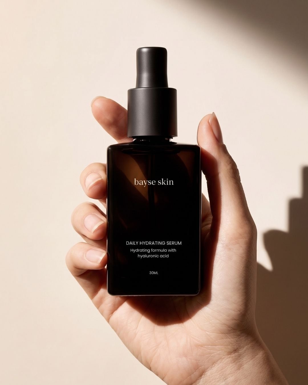 Daily Hydration Serum In Hand.jpg