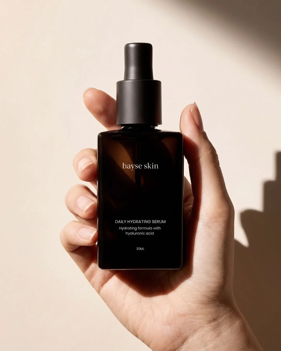 Daily Hydration Serum In Hand.jpg