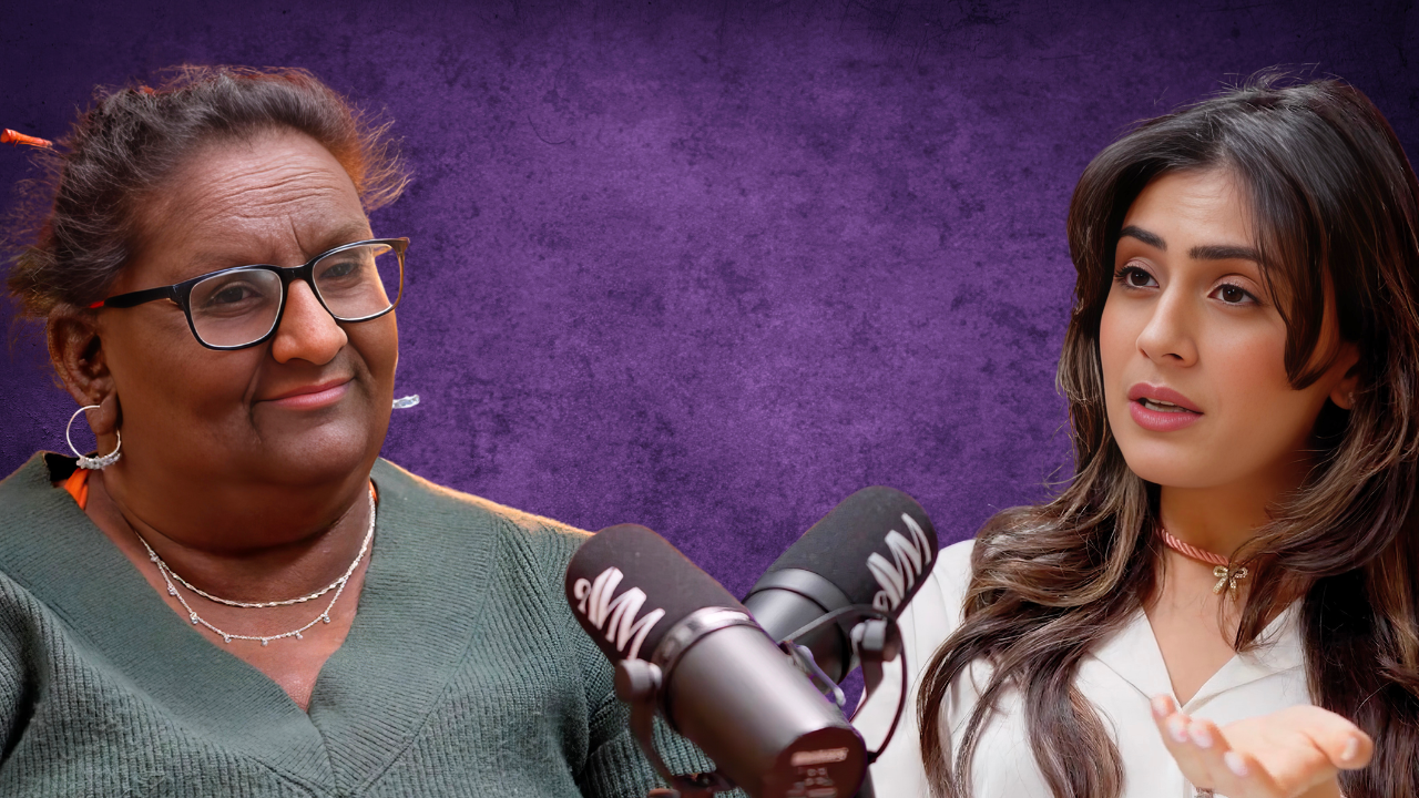 Two women speaking into mics during a podcast or radio interview, with a purple textured background.
