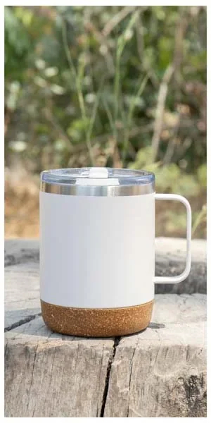 White Explorer mug sitting on a rock wall