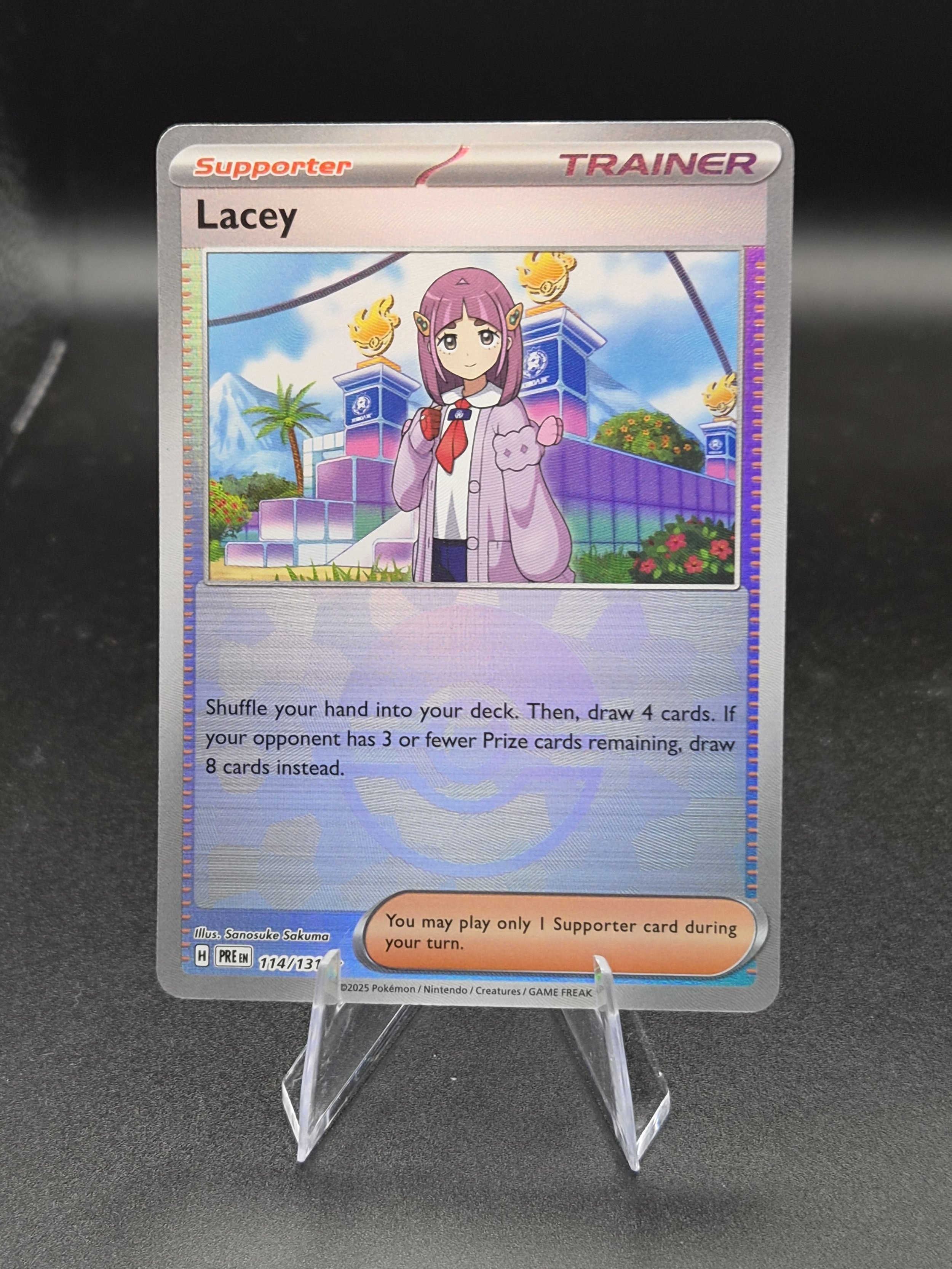 Lacey 114/131 Prismatic Evolutions Reverse Holo Pokémon Card