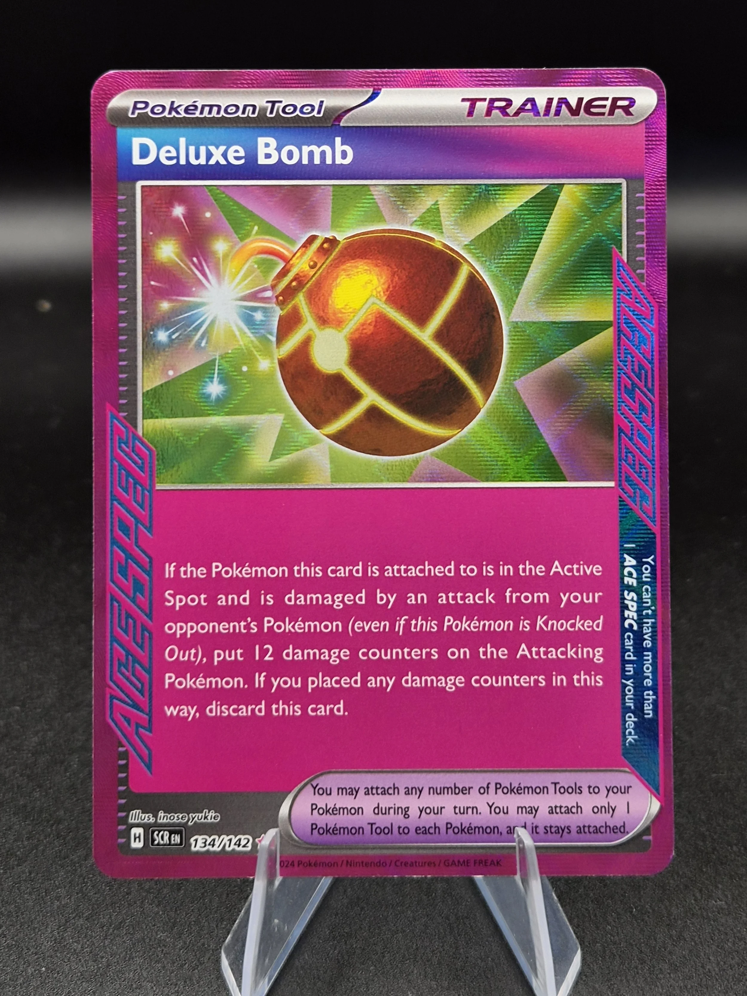 Deluxe Bomb 134/142 Stellar Crown English Holo Pokémon Card